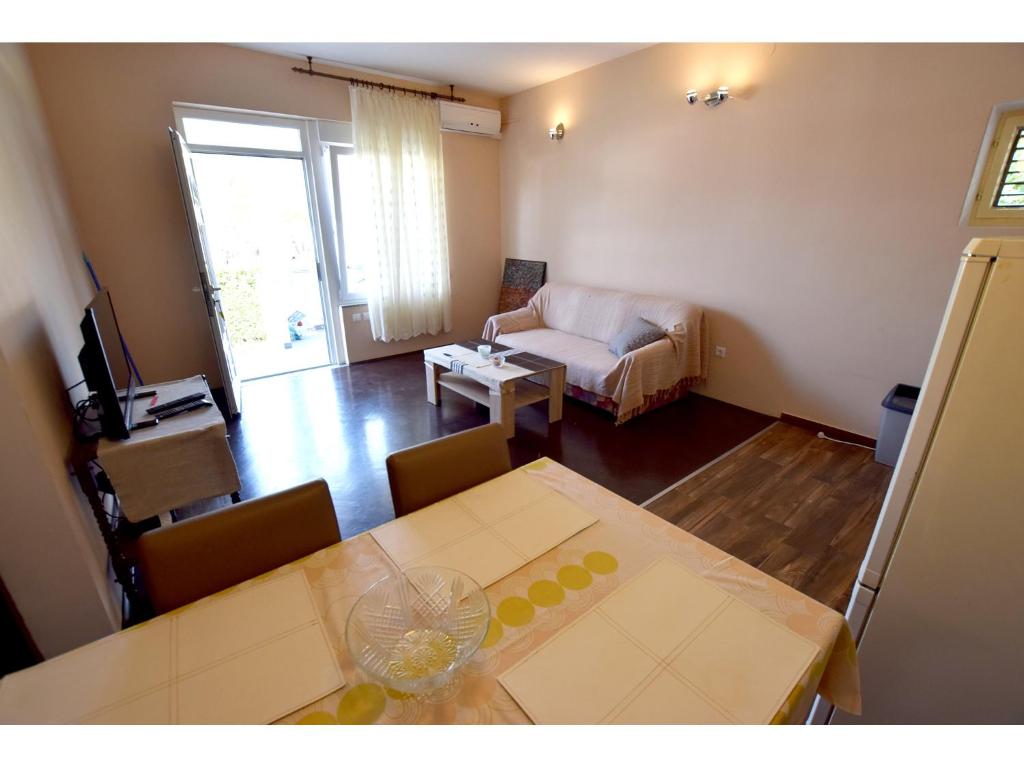 Ένα ή περισσότερα κρεβάτια σε δωμάτιο στο Apartments LaRoom