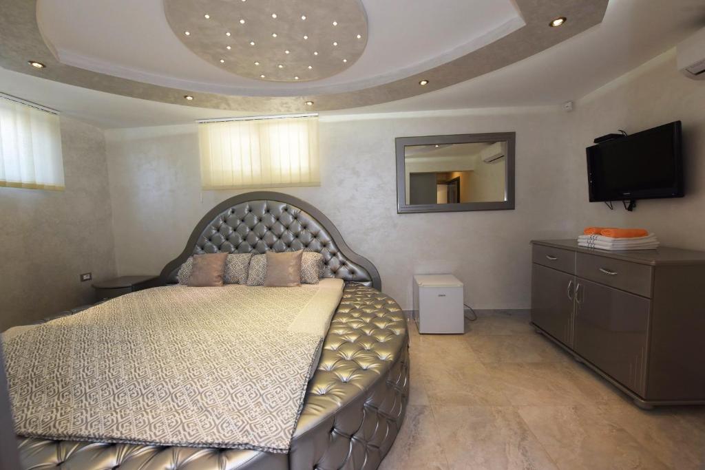 Telewizja i/lub zestaw kina domowego w obiekcie Villa Valerio