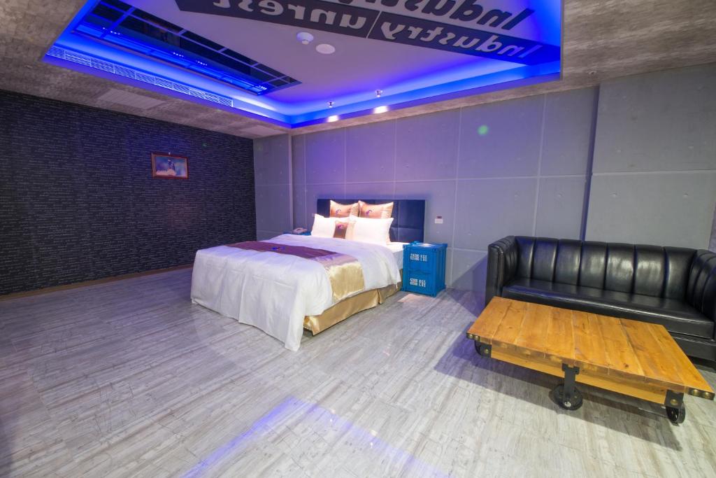 Postel nebo postele na pokoji v ubytování Ting-Shuai Motel