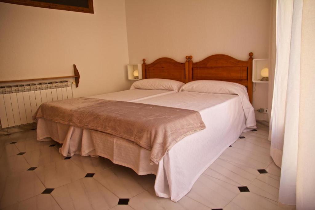 Posteľ alebo postele v izbe v ubytovaní Casa Pintor