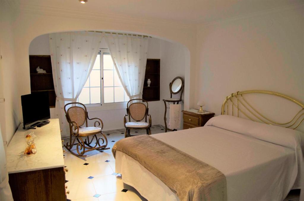 Posteľ alebo postele v izbe v ubytovaní Casa Pintor