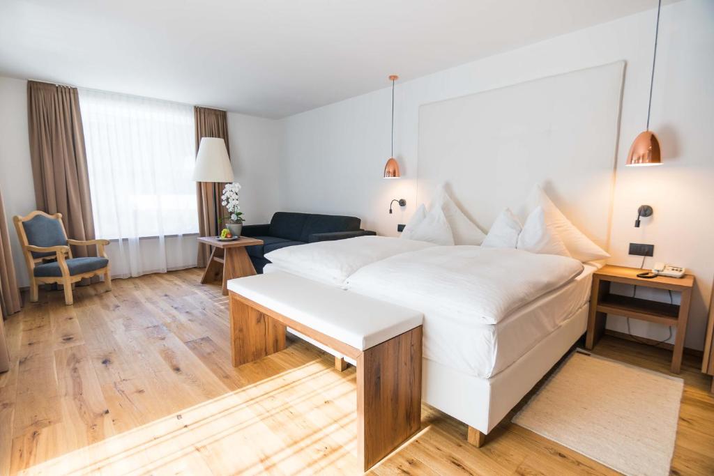Postel nebo postele na pokoji v ubytování Hotel Conturines