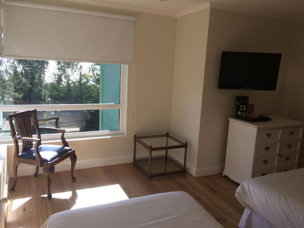 Postel nebo postele na pokoji v ubytování Hotel Isla Seca