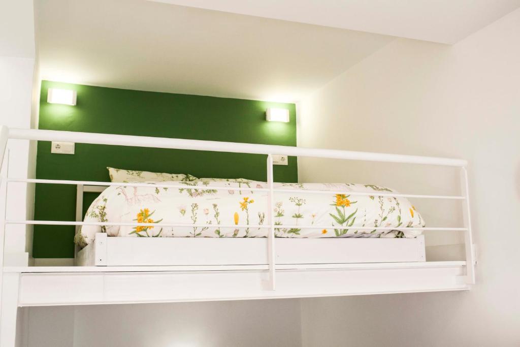 A bed or beds in a room at Letmalaga Comedy