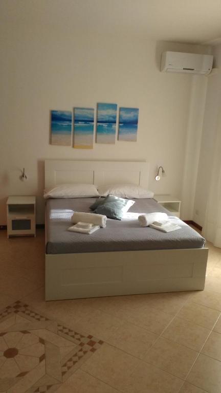Postel nebo postele na pokoji v ubytování B&B Cielo & Mare