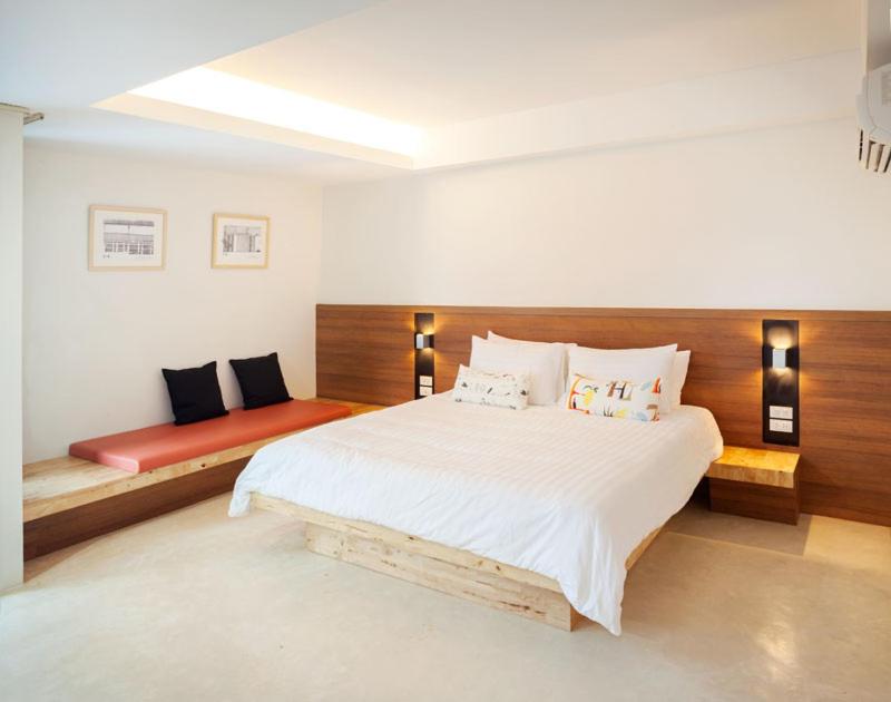 Postel nebo postele na pokoji v ubytování NornDee Hotel