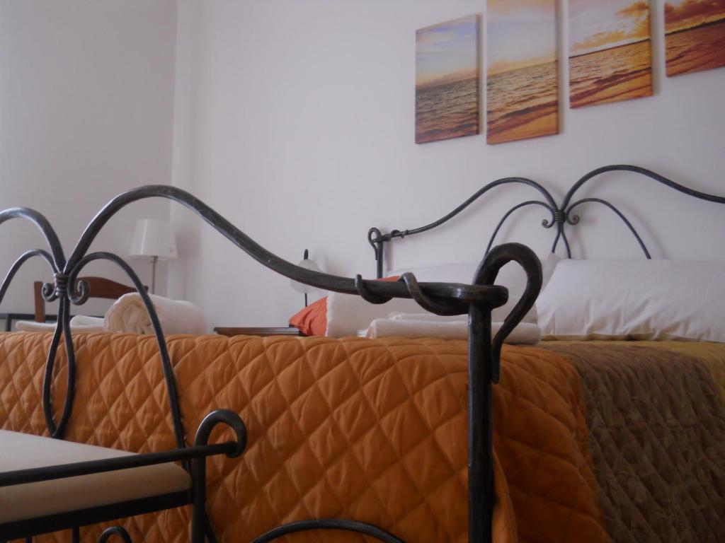 Postel nebo postele na pokoji v ubytování B&B Cielo & Mare