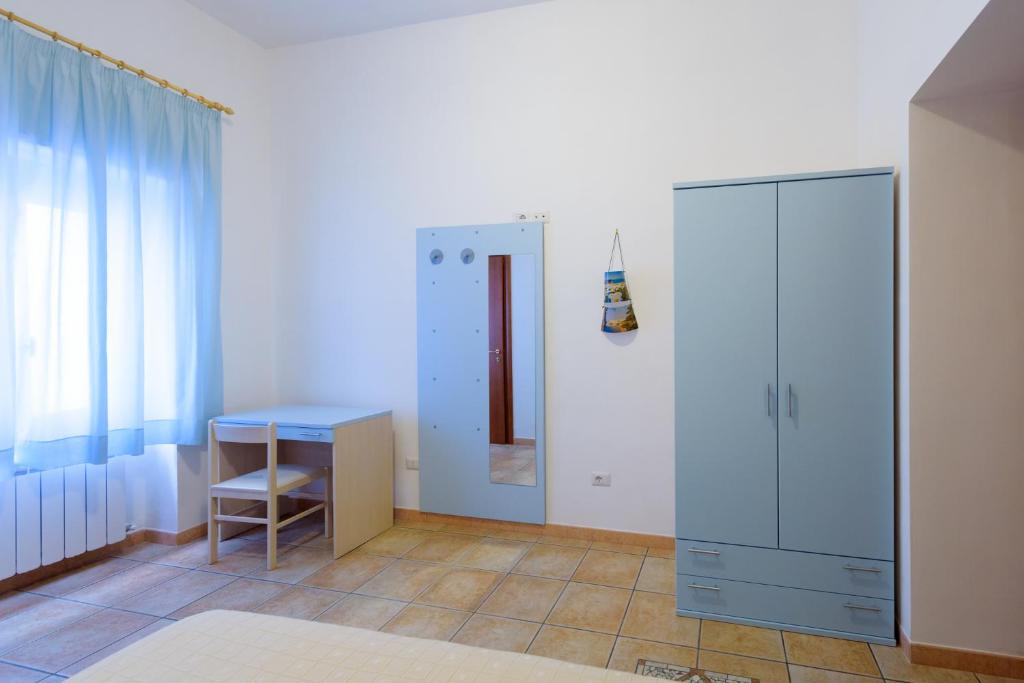 Postel nebo postele na pokoji v ubytování B&B Rose Villa