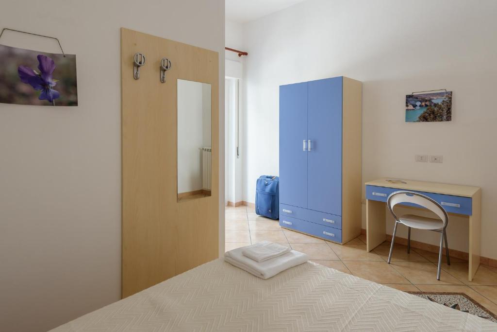 Postel nebo postele na pokoji v ubytování B&B Rose Villa