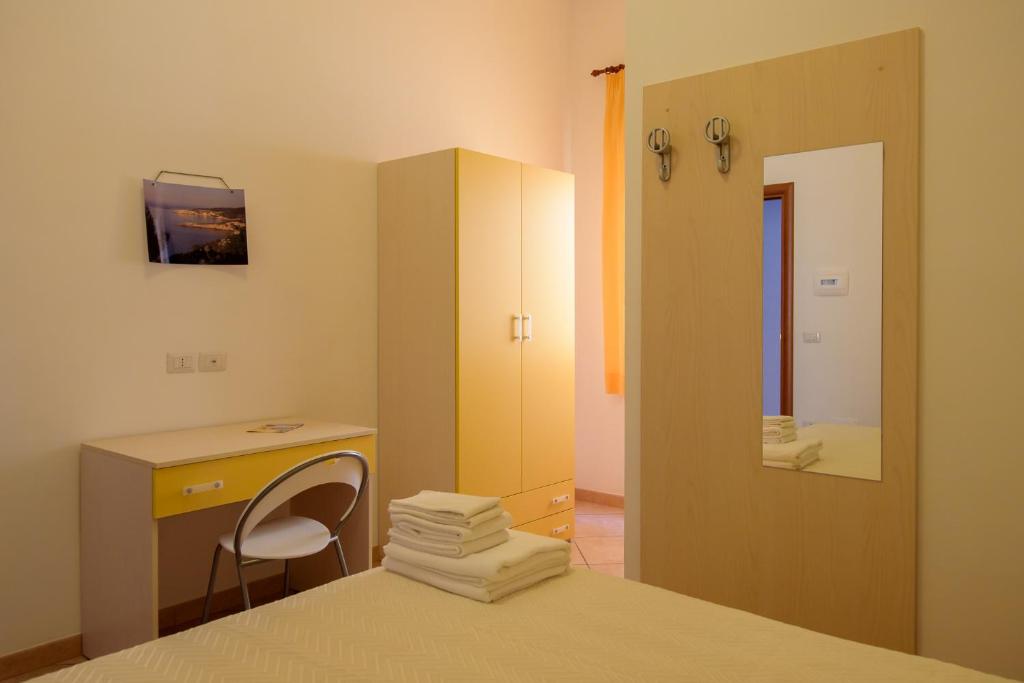 Postel nebo postele na pokoji v ubytování B&B Rose Villa