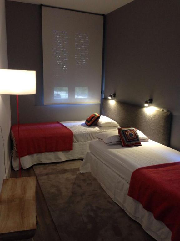 Posteľ alebo postele v izbe v ubytovaní Apartamentos RG Dúplex San Bernardo