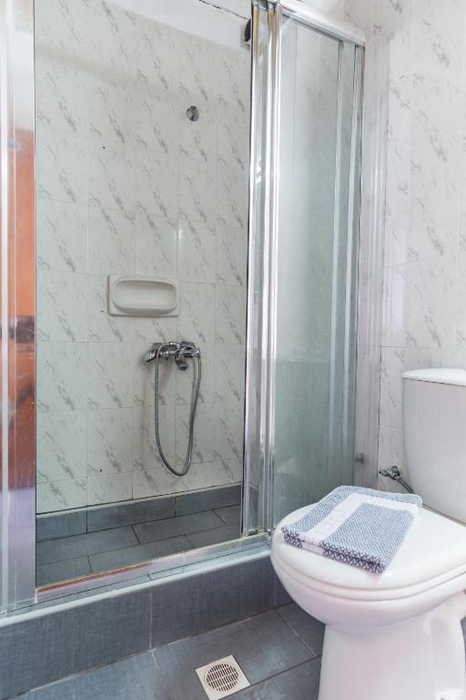 Koupelna v ubytování Daskalogiannis Hotel