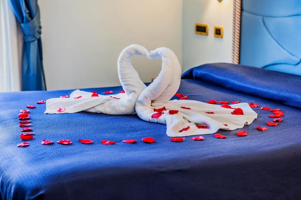 Postel nebo postele na pokoji v ubytování Aragona Palace Hotel & Spa