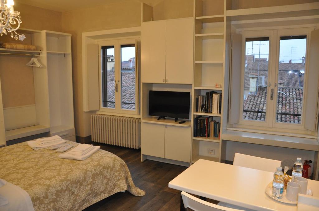 Postel nebo postele na pokoji v ubytování La Mainolda B&B