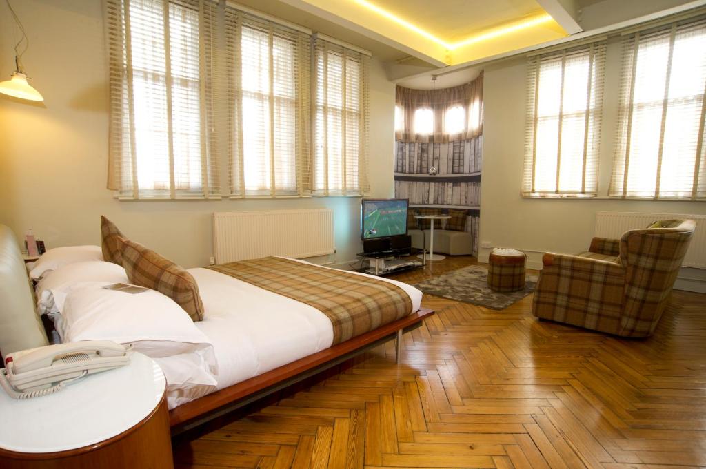 Postel nebo postele na pokoji v ubytování ABode Manchester
