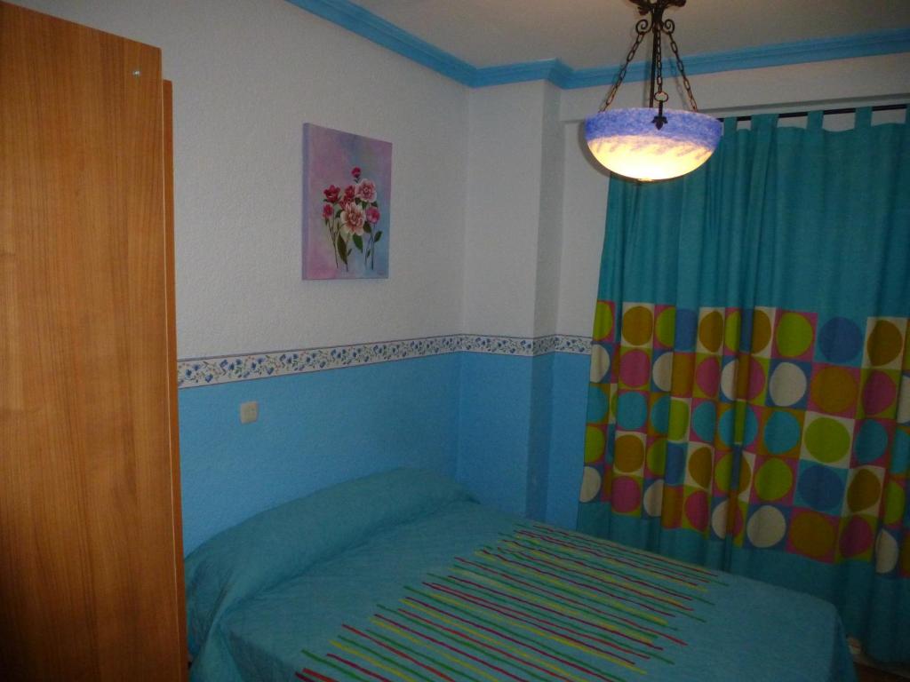 Postel nebo postele na pokoji v ubytování Casa Limas