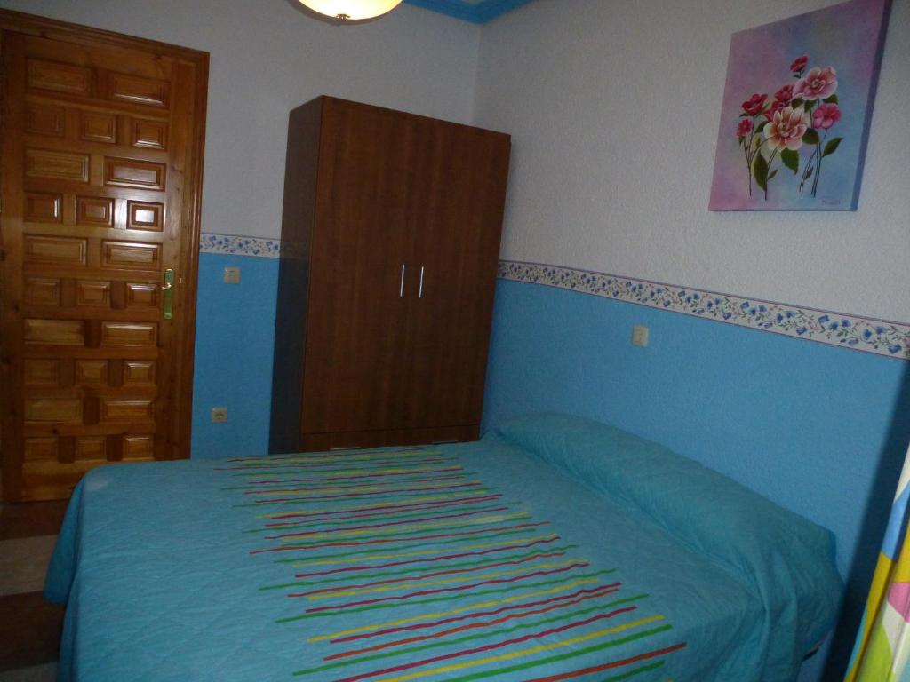 Postel nebo postele na pokoji v ubytování Casa Limas