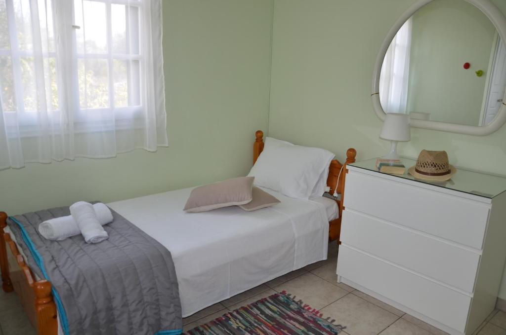 Postel nebo postele na pokoji v ubytování Villa Clementine