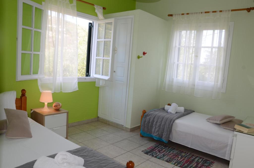 Postel nebo postele na pokoji v ubytování Villa Clementine