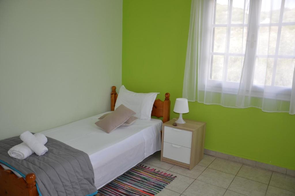 Postel nebo postele na pokoji v ubytování Villa Clementine