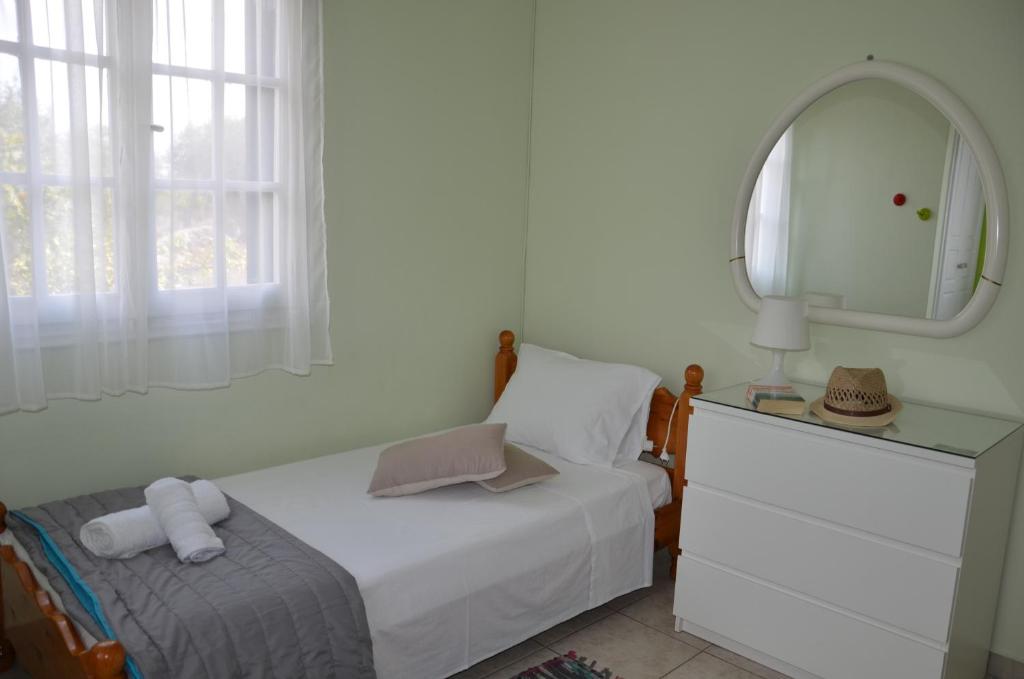 Postel nebo postele na pokoji v ubytování Villa Clementine