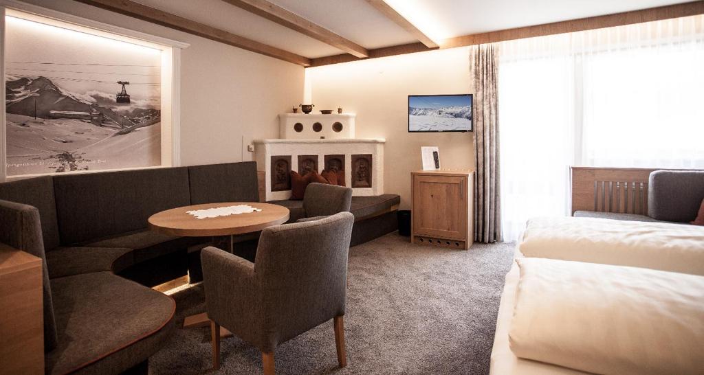 Posezení v ubytování Hotel Gramaser