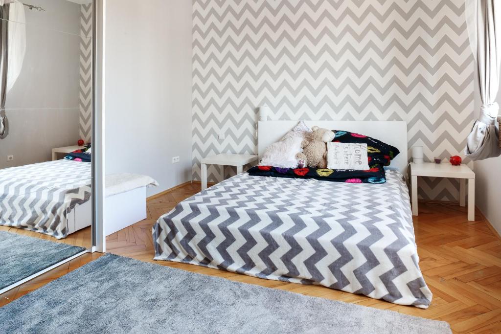 Posteľ alebo postele v izbe v ubytovaní Rzeszów Apartment
