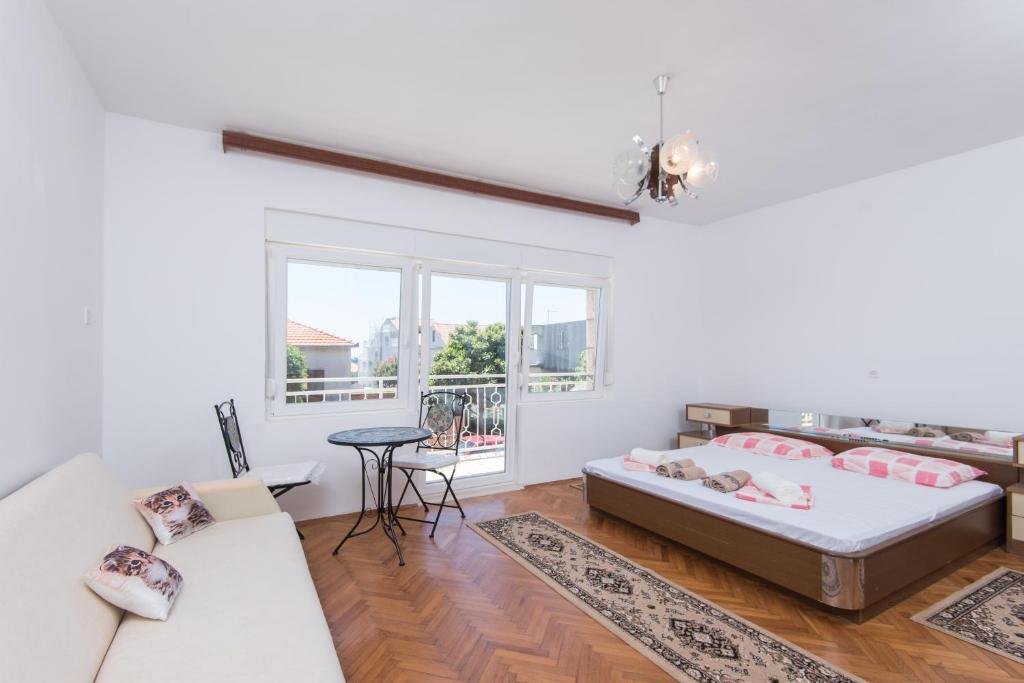 Posteľ alebo postele v izbe v ubytovaní Holiday Home Costa