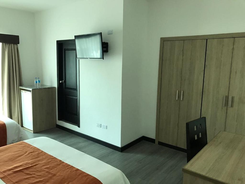 Postel nebo postele na pokoji v ubytování Hotel Mar Azul
