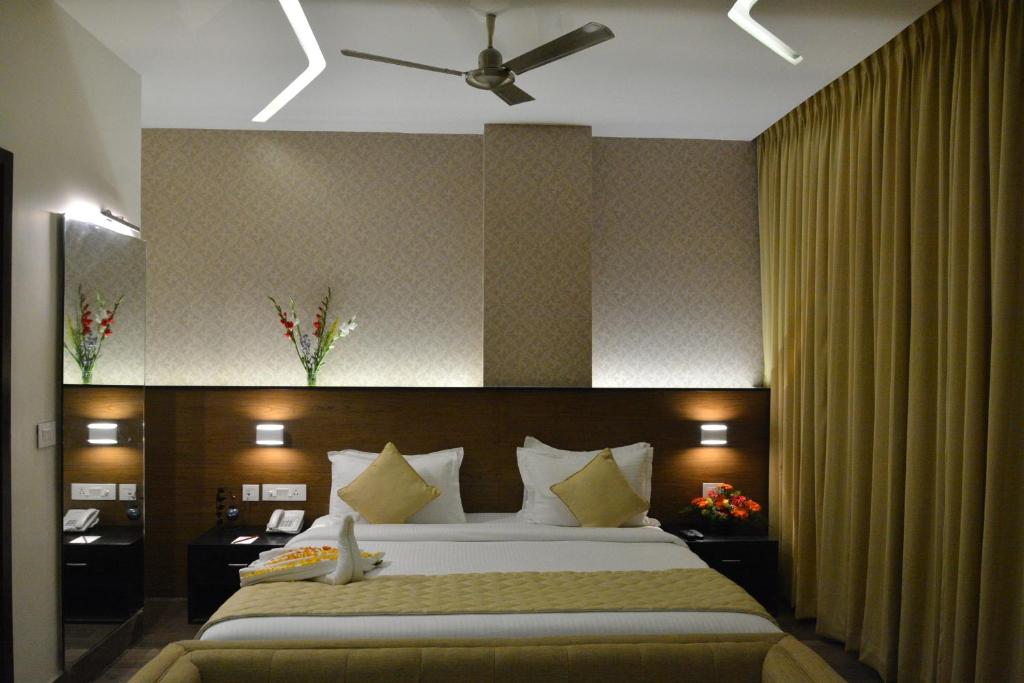 En eller flere senger på et rom på Hotel Sree Annamalaiyar Park