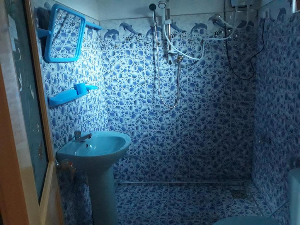 Koupelna v ubytování Deneth Homestay