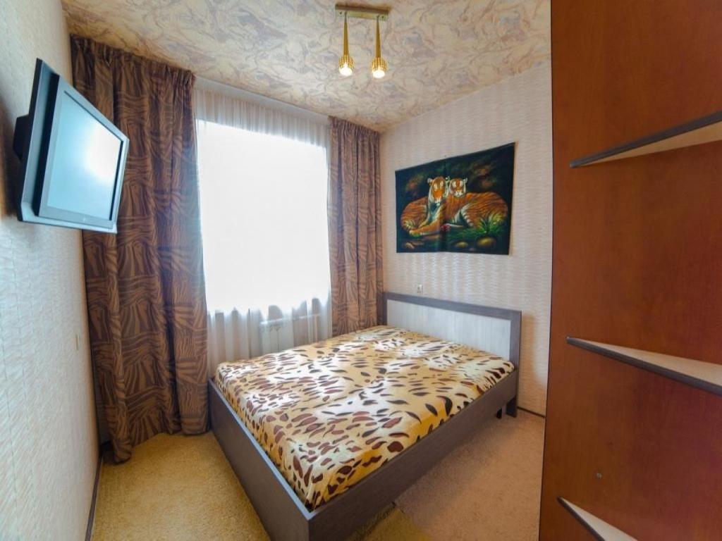 En eller flere senge i et værelse på Апартаменты на 78-й Добровольческой Бригады - 19