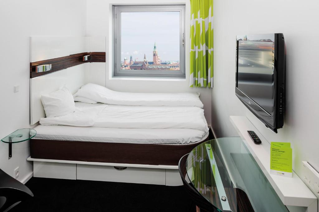 Wakeup Copenhagen - Carsten Niebuhrs Gade tesisinde bir odada yatak veya yataklar