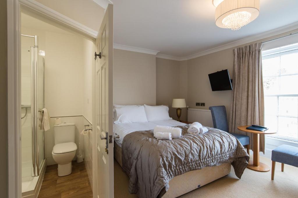 Postel nebo postele na pokoji v ubytování No 46 Marine Terrace