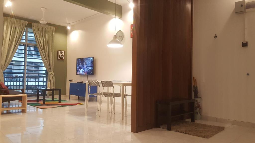 TV a/nebo společenská místnost v ubytování Tulip Hotel