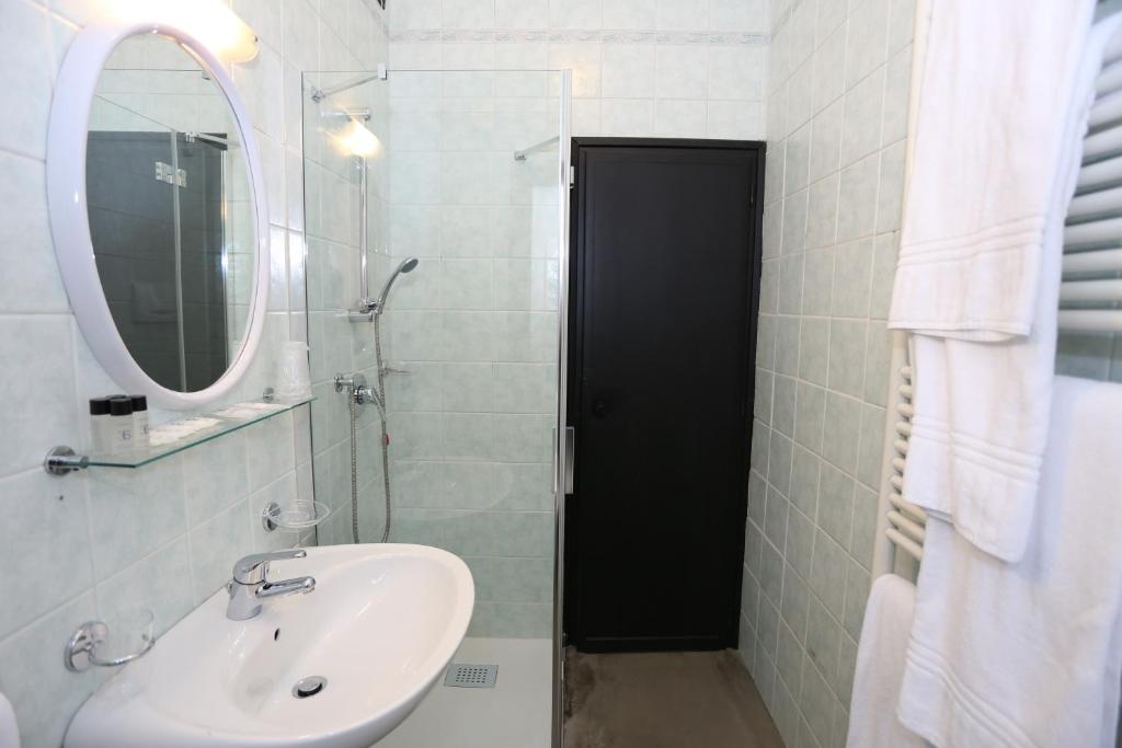 Koupelna v ubytování Hotel Mignon