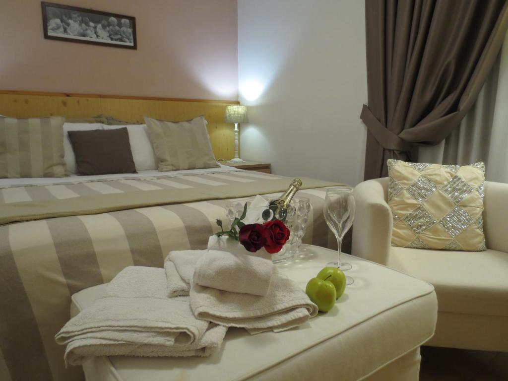 Postel nebo postele na pokoji v ubytování Hotel Aurora