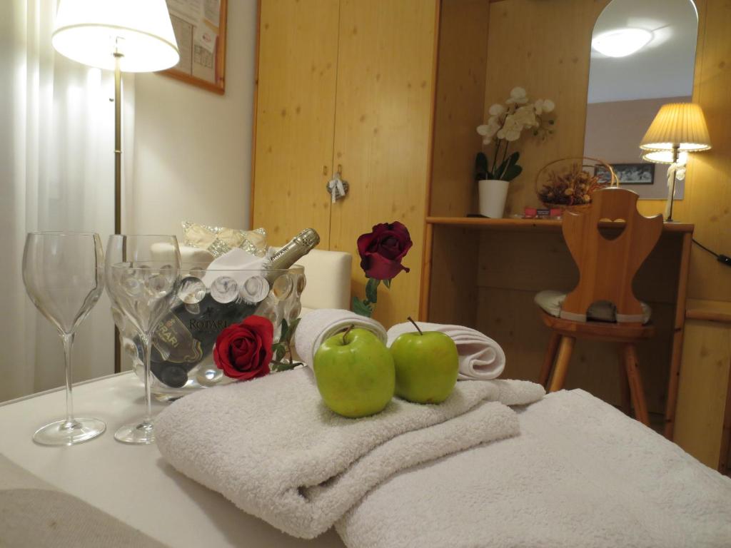 Postel nebo postele na pokoji v ubytování Hotel Aurora