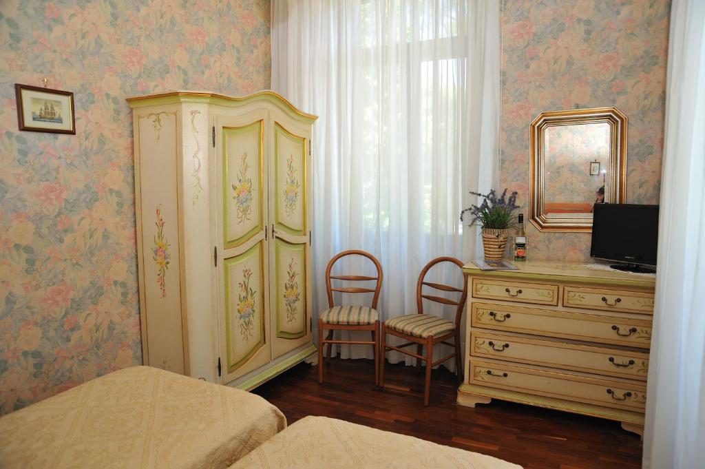 TV a/nebo společenská místnost v ubytování Hotel Savona