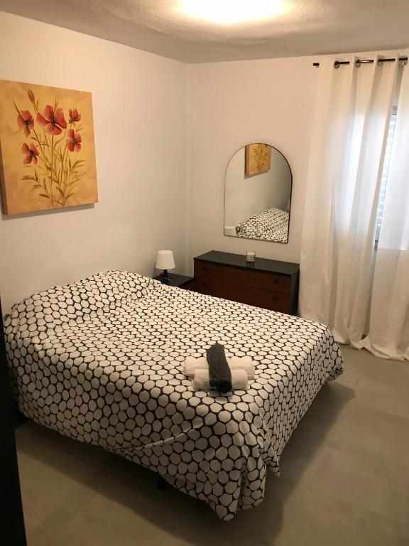 Posteľ alebo postele v izbe v ubytovaní Apartamento Eucalipto