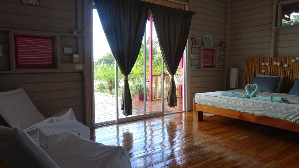 Postel nebo postele na pokoji v ubytování La Colina Pura Vista