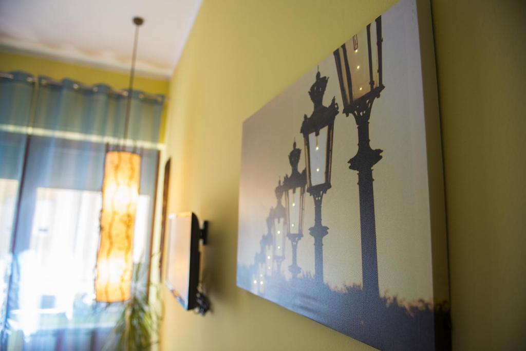 TV a/nebo společenská místnost v ubytování Dolce Conca D'Oro B&B