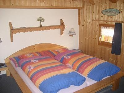 Postel nebo postele na pokoji v ubytování B&B Haus im Sand