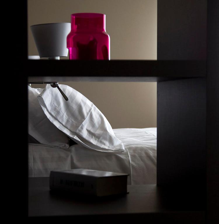 Postel nebo postele na pokoji v ubytování Zara Rooms & Suites