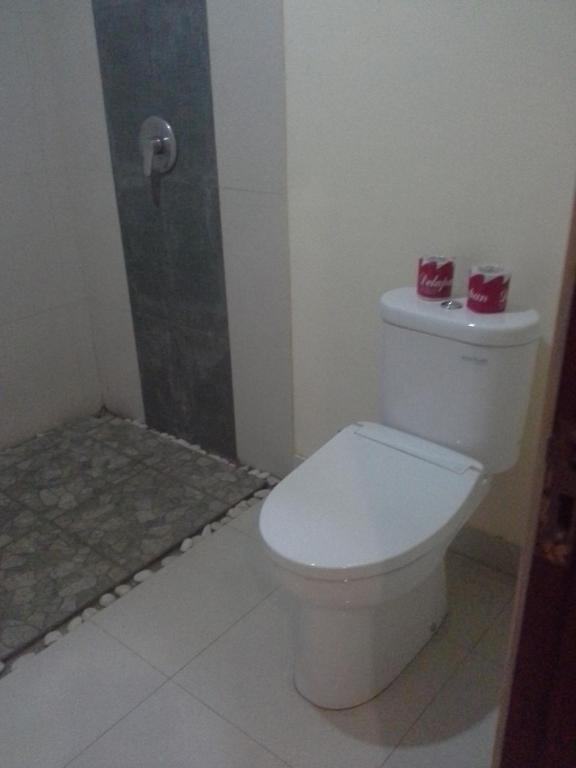 Koupelna v ubytování dewi ayu accomodation
