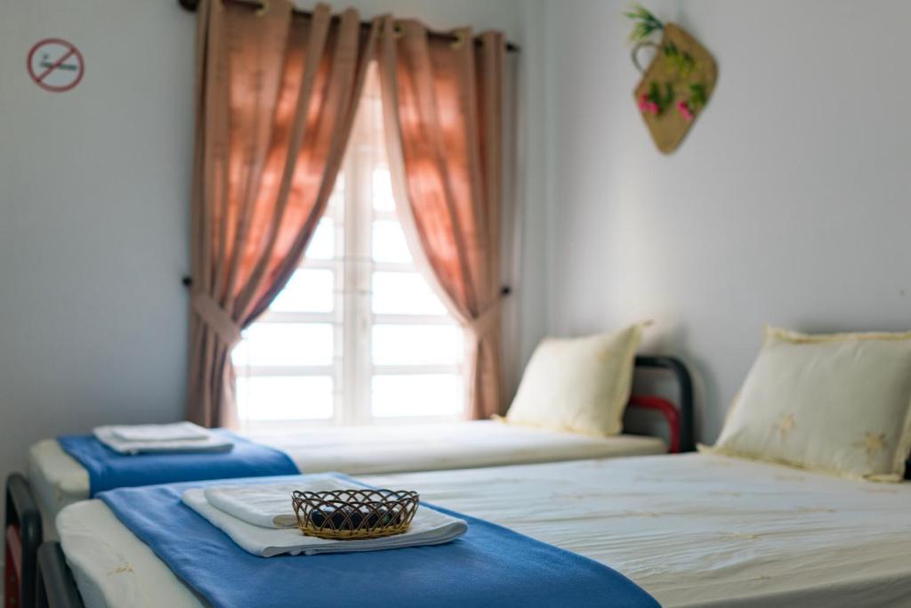 Postel nebo postele na pokoji v ubytování My Home Guest House