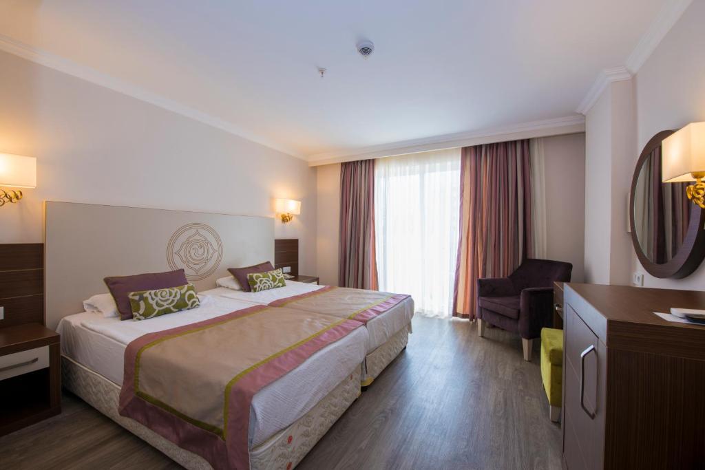 Postel nebo postele na pokoji v ubytování Side Alegria Hotel & Spa - All Inclusive-Adult Only