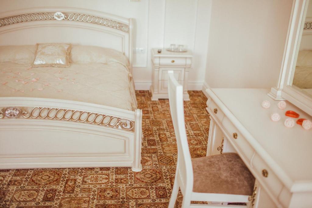 Postel nebo postele na pokoji v ubytování Warszawa Hotel