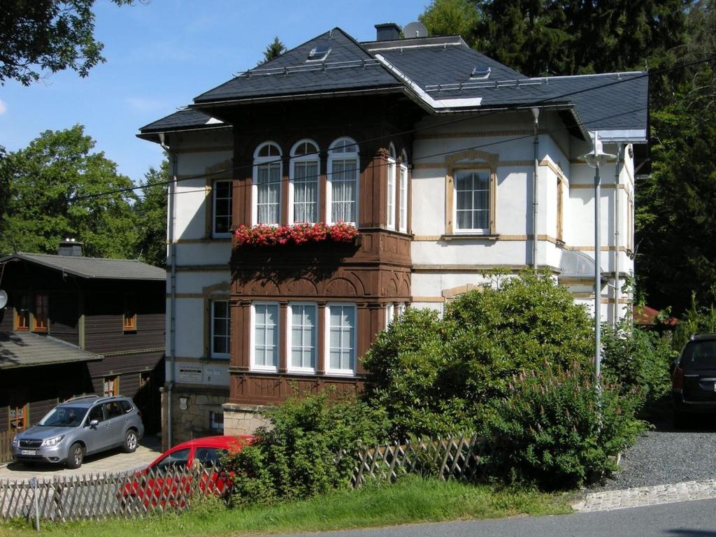 a house with flowers on the side of it at Villa Angelika in Kurort Altenberg