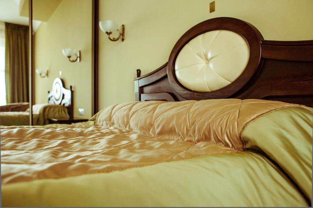 Postel nebo postele na pokoji v ubytování Warszawa Hotel